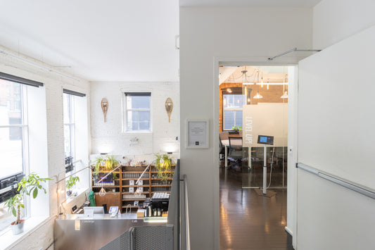 The airy reception at StartWell sees a board room on the mezzanine overlooking our reception cafe