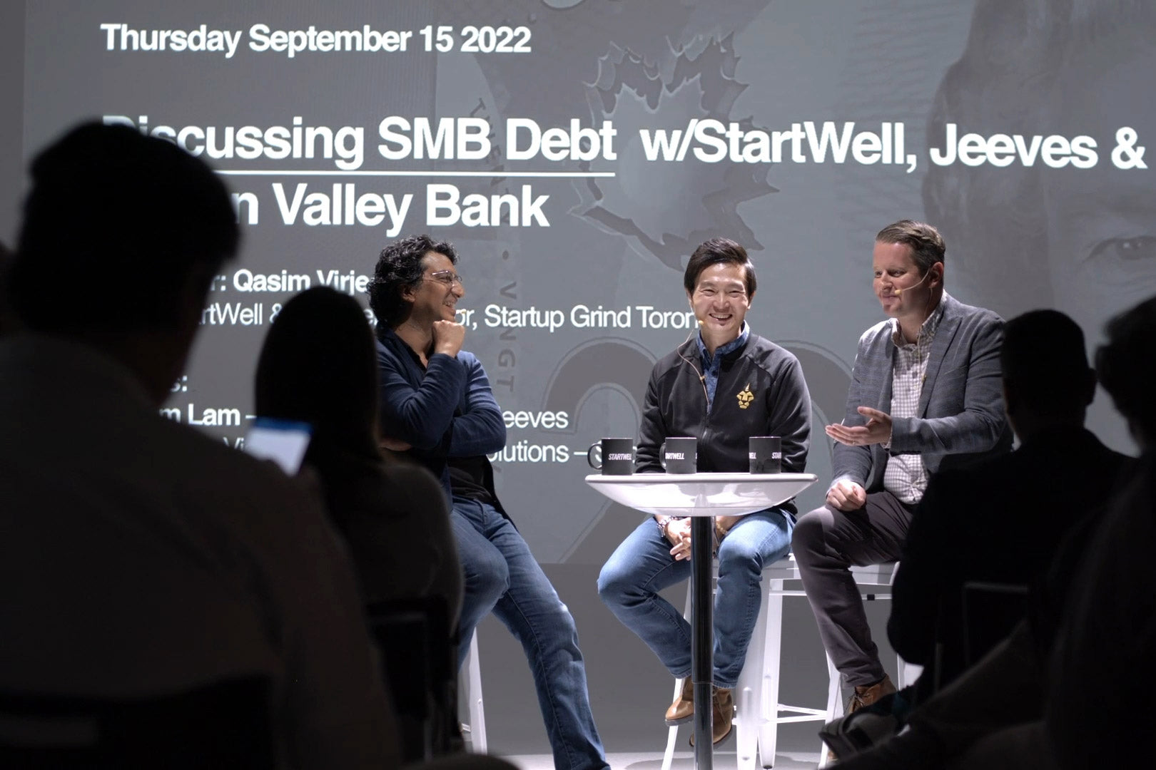 William Lam from Jeeves, Filip Stoj from Silicon Valley Bank and Qasim Virjee from StartWell on stage for Startup Grind Toronto on 09/15/22